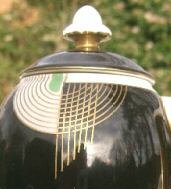 the top of a coffee jug in tango Gold/White/Green