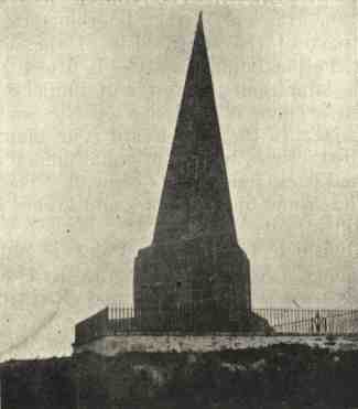A conical tower on a square base surrounded by railings